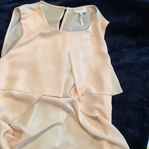 Soft peach sleeveless blouse. Size 12